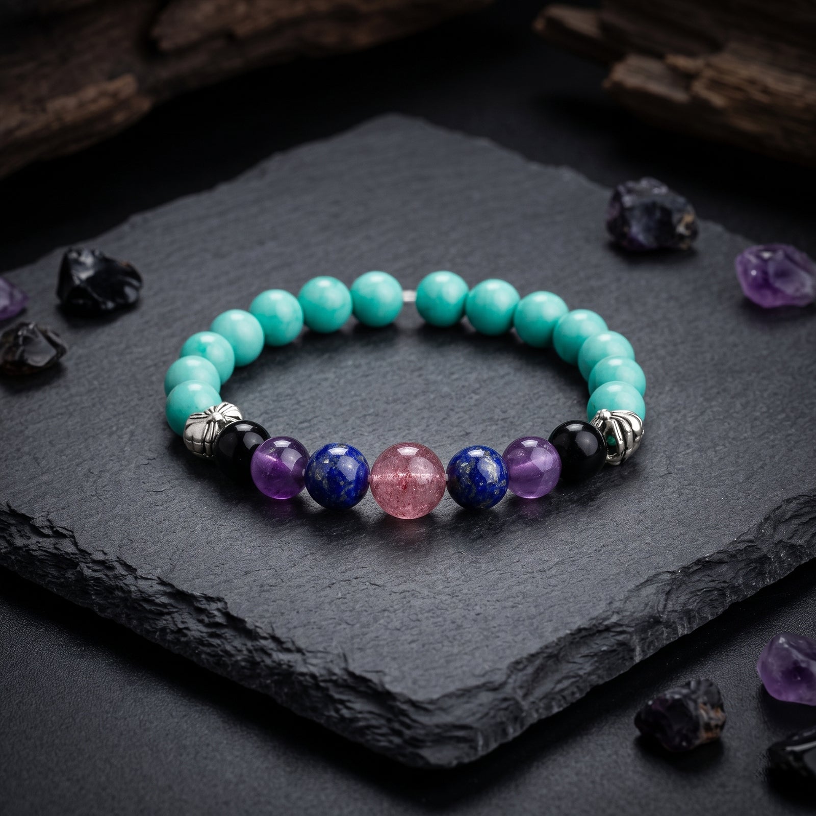 Crystal bead bracelet with turquoise side beads and purple, blue and pink center beads
