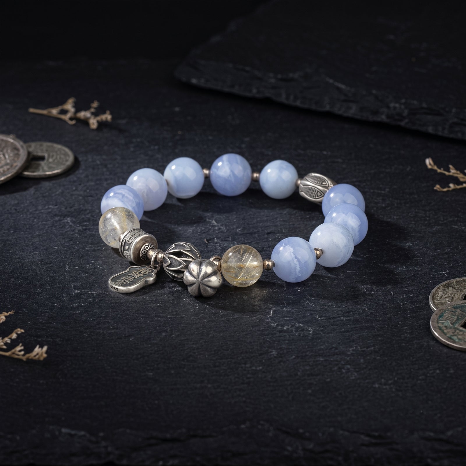 Light blue lace agate bead bracelet with silver-tone flower and moon charms