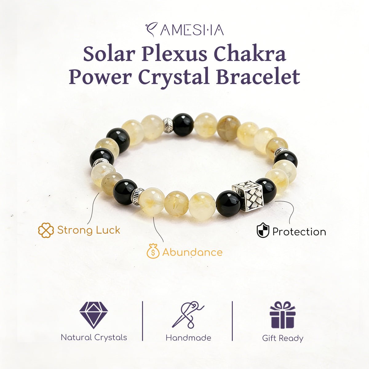 Chakra power crystal bracelet, pale yellow and black beads with carved silver charm