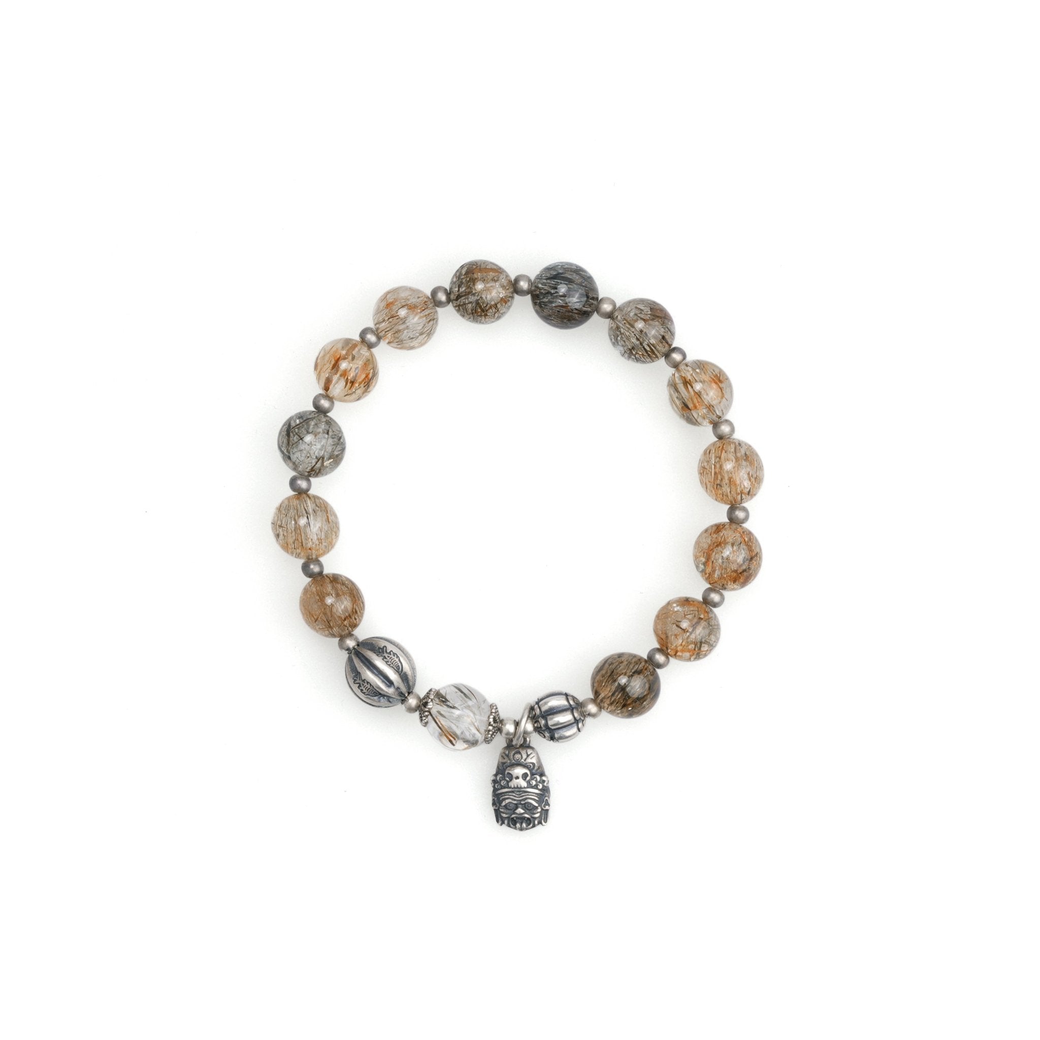 Stone beaded bracelet with round beads and a small dangling silver charm