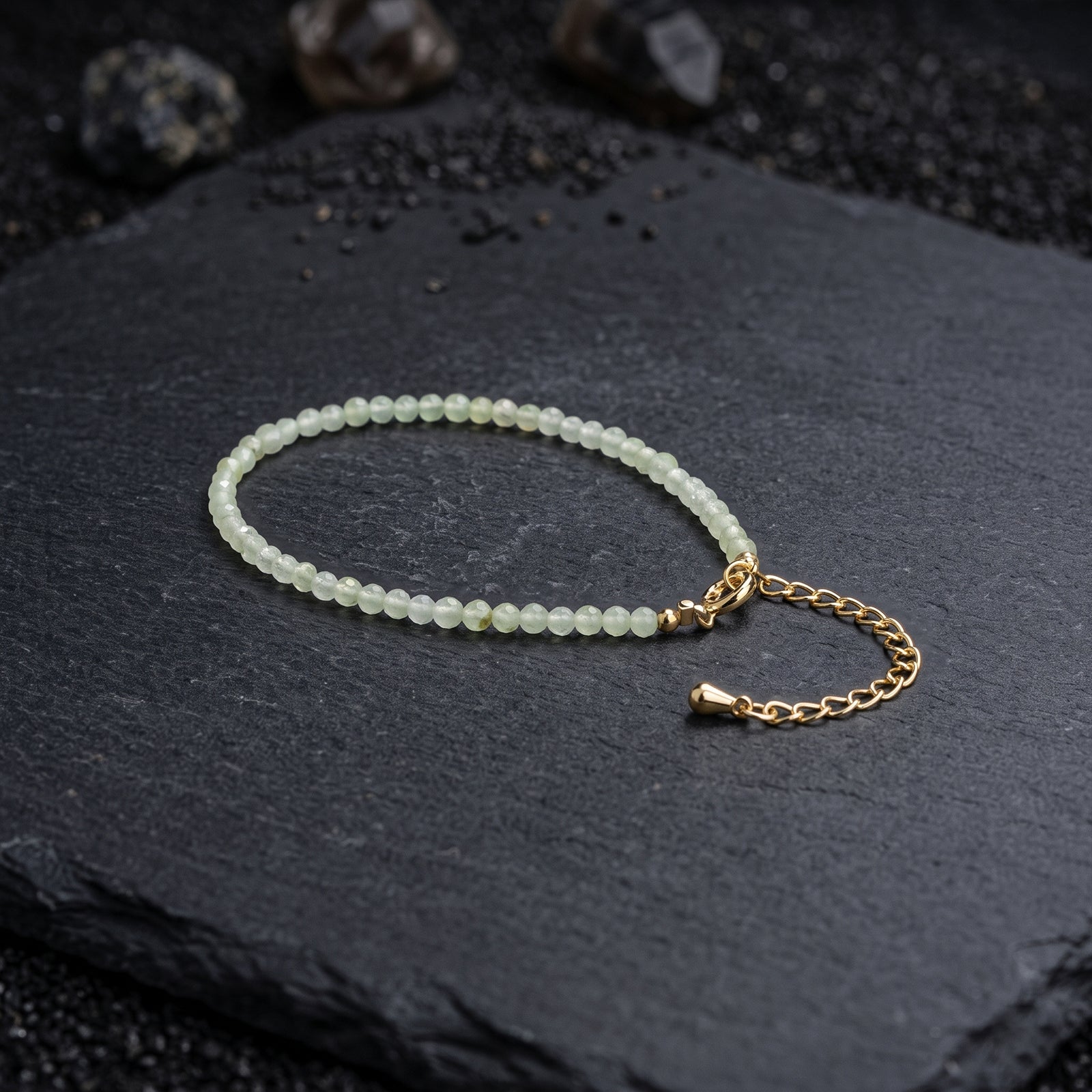 Light green crystal bead bracelet with gold clasp and extender chain