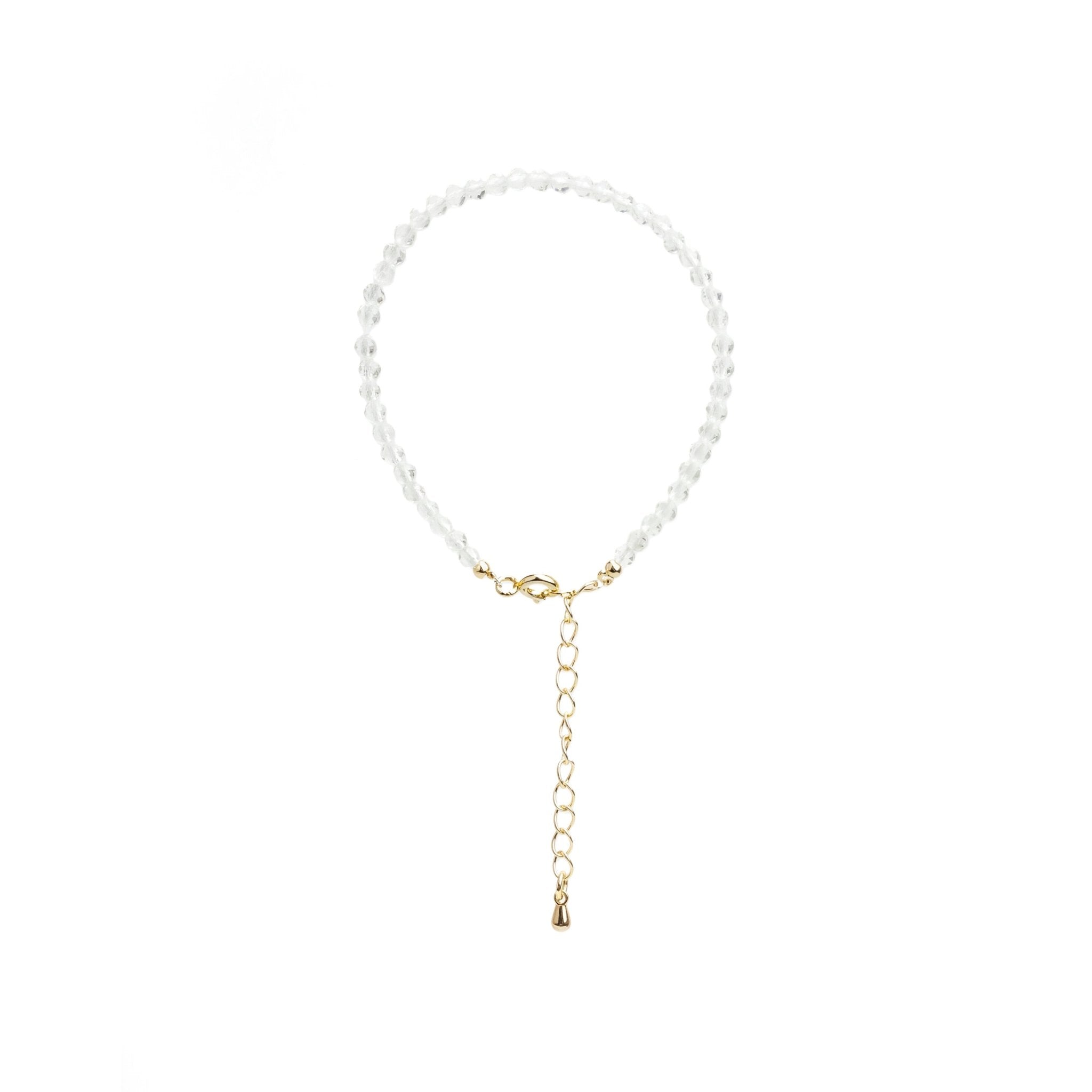 Clear quartz crystal bead bracelet with gold clasp and dangling charm