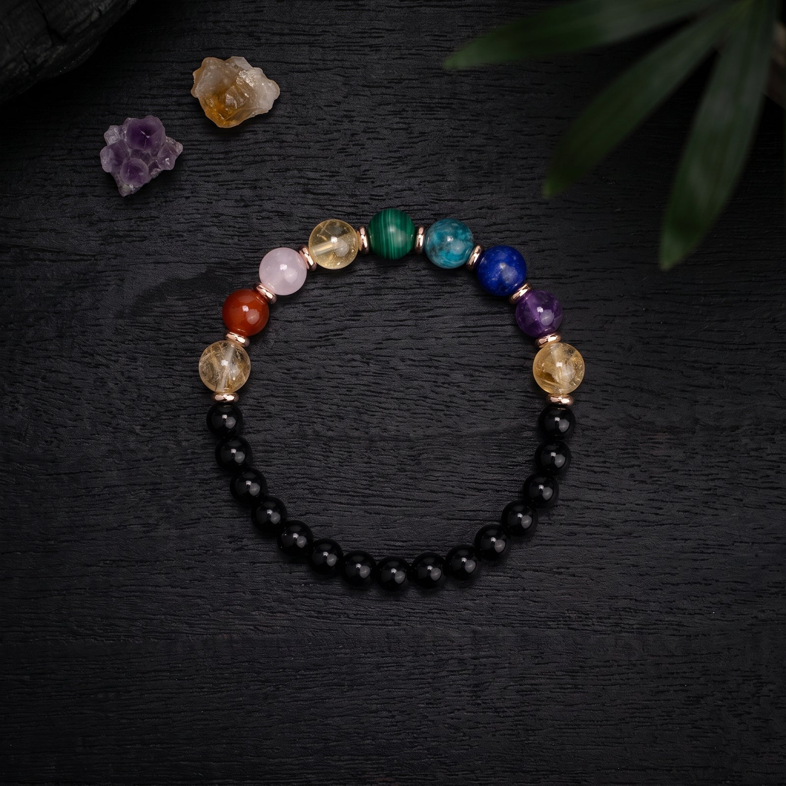 Beaded crystal energy bracelet with black beads and colorful round gemstone accents