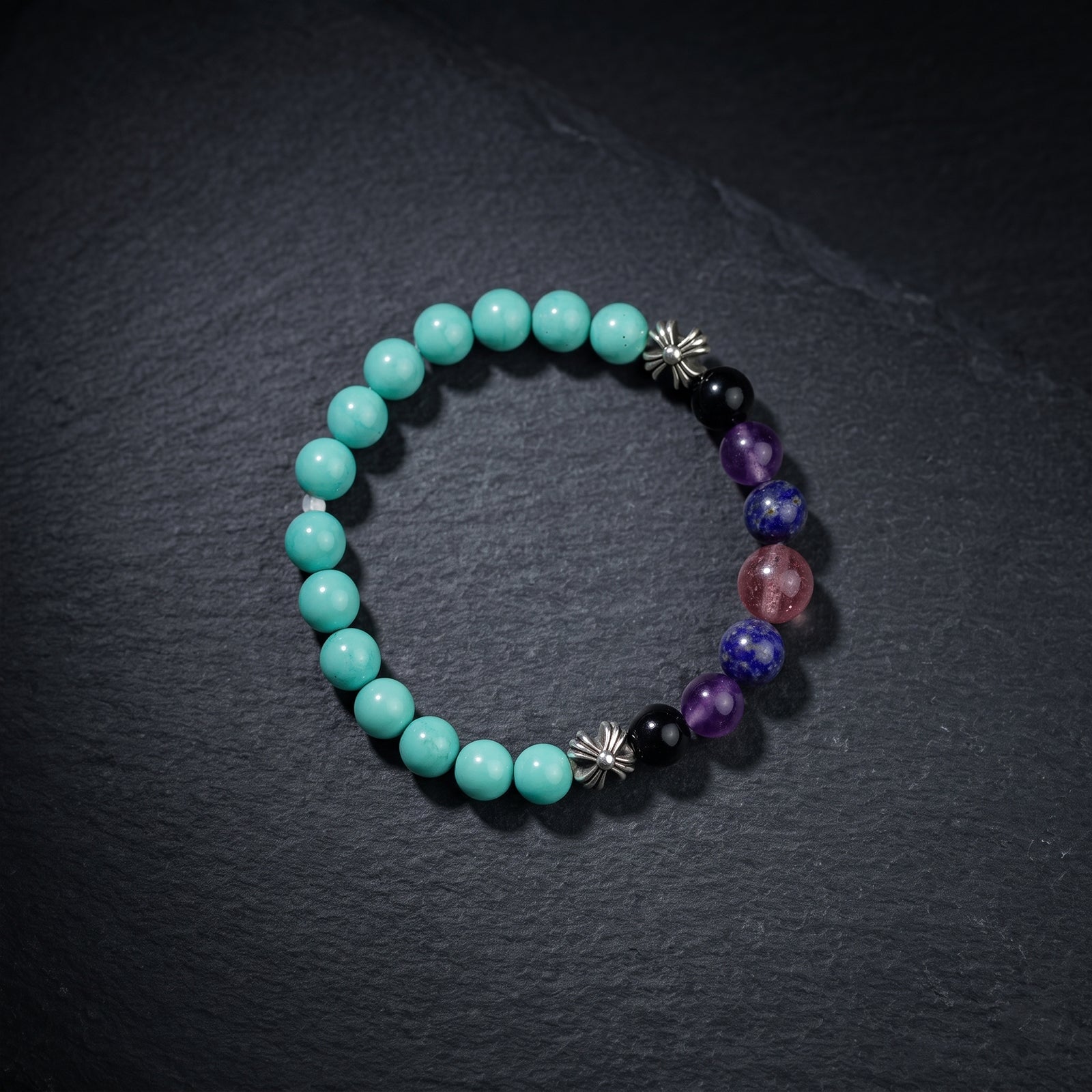 Triple crystal bead bracelet with turquoise, purple, lapis-blue and pink beads