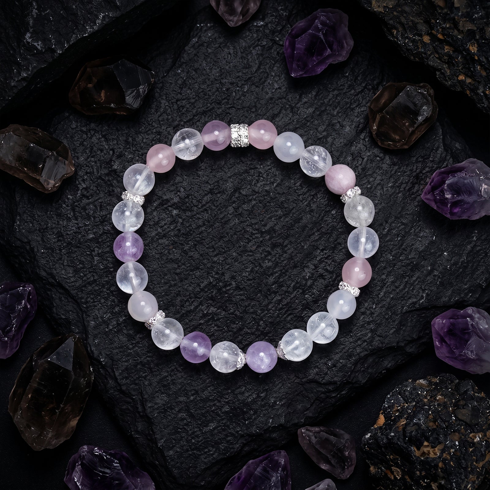 Crystal beaded bracelet with round clear, amethyst-lavender, and rose-pink beads