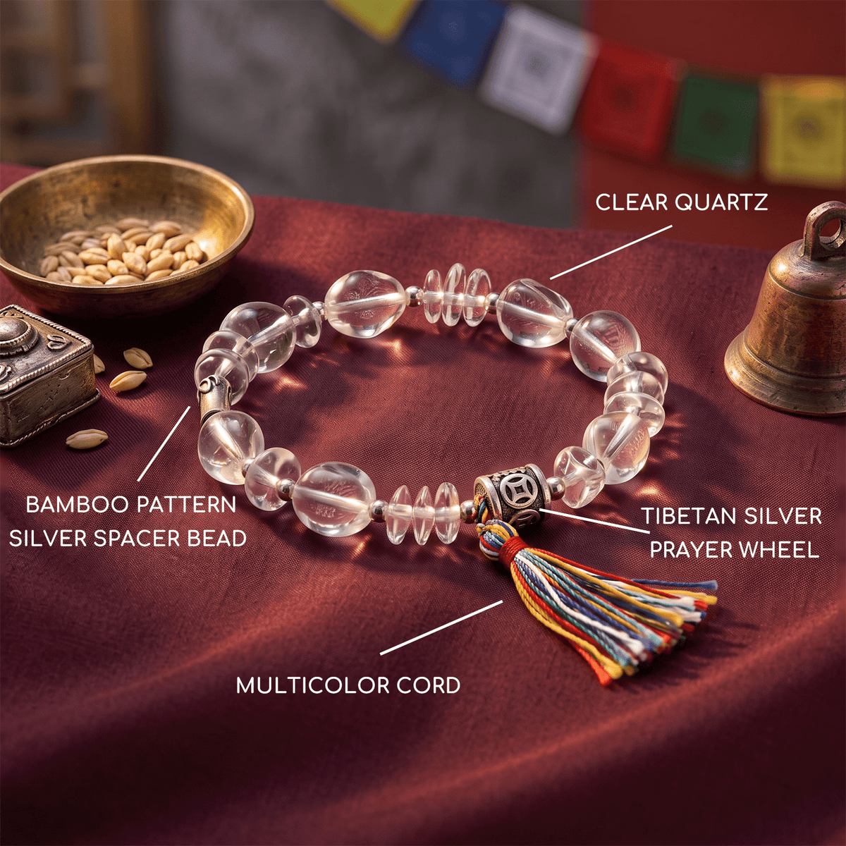 Clear quartz bead bracelet with Tibetan silver prayer-wheel bead and multicolor tassel