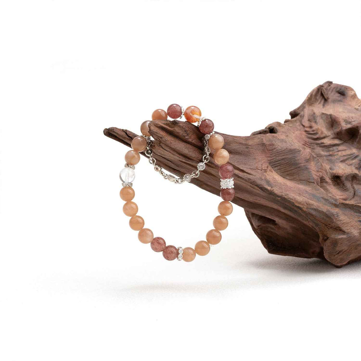Crystal beaded bracelet with mixed peach and burgundy stones and silver-tone chain accent