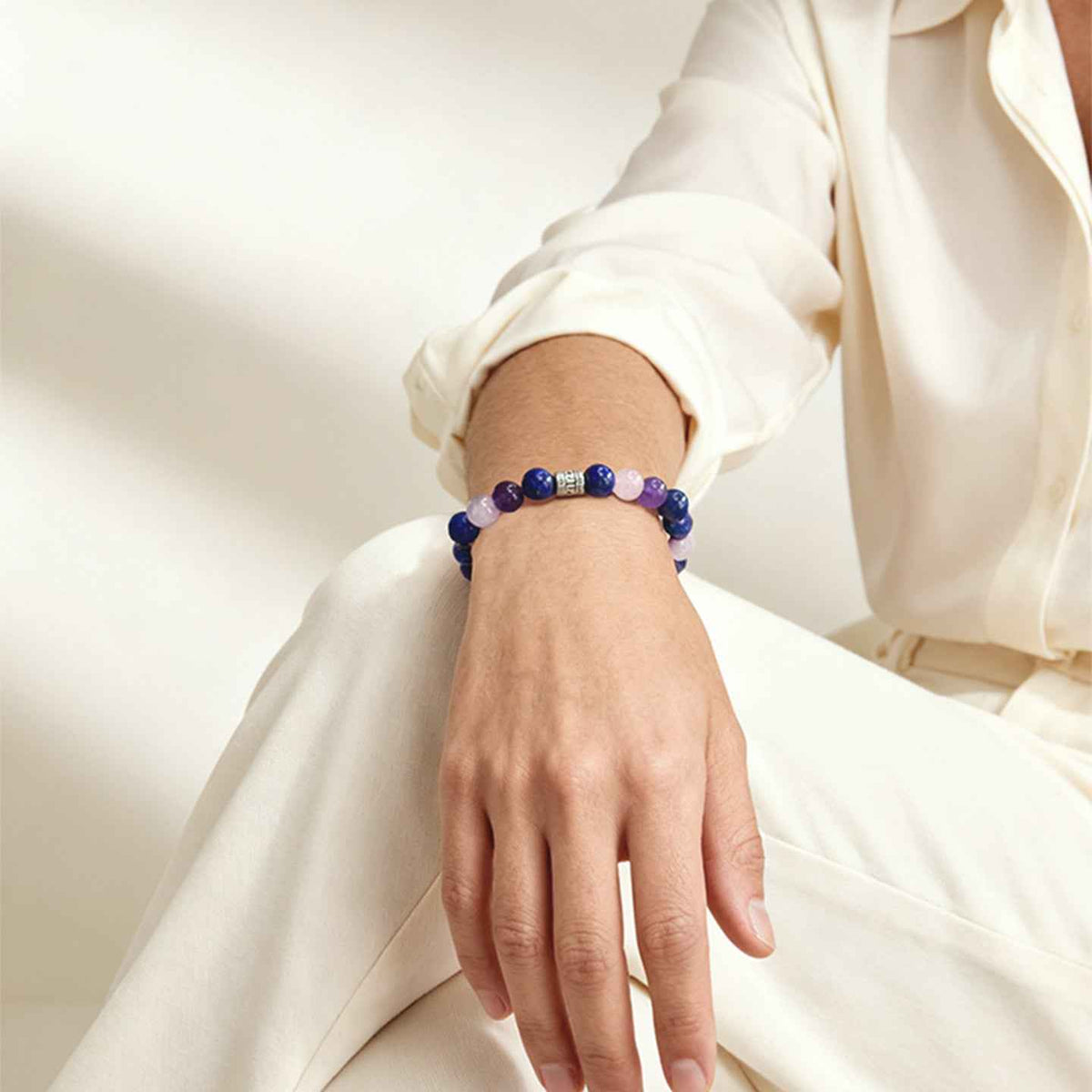 Amesha Energy Ajna Chakra Clarity Crystal Bracelet - Woman wearing Lapis Lazuli and Amethyst beads for intuition and focus