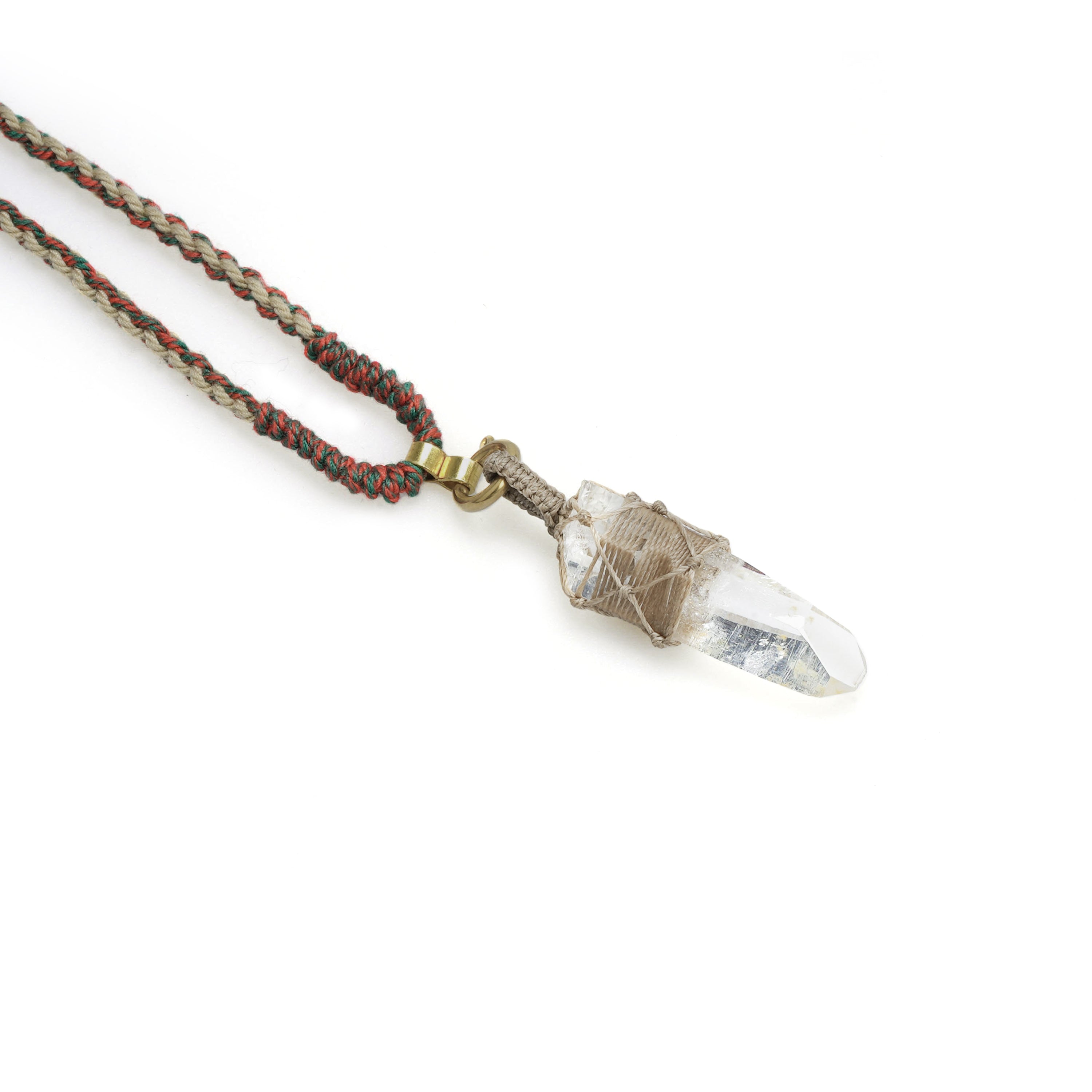 Quartz point wrap pendant with gold tone clasp and wire cage on twisted beaded cord