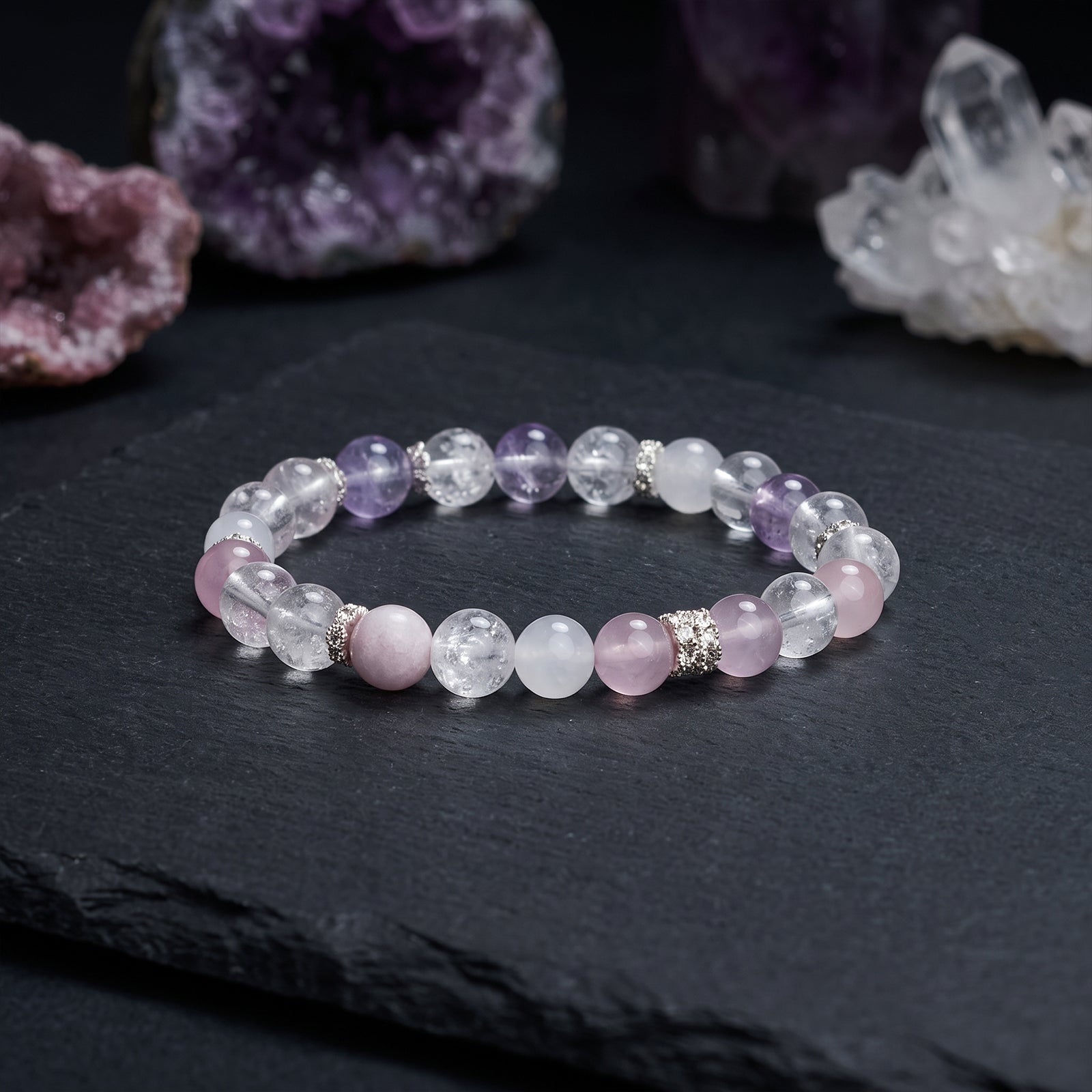 Crystal beaded bracelet with clear, lavender, and pink stones and silver spacer beads