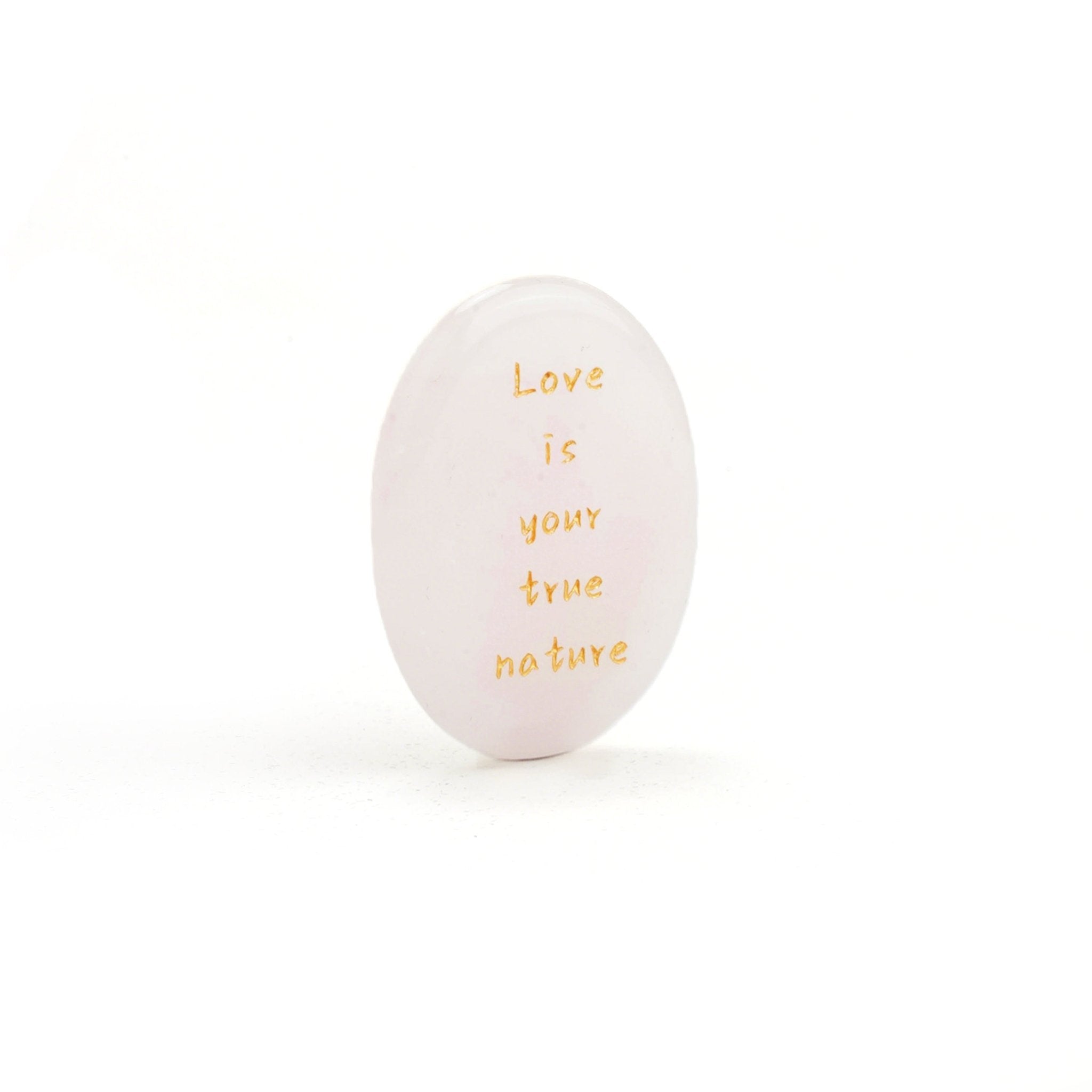 Rose quartz oval stone with gold message, Love is your true nature