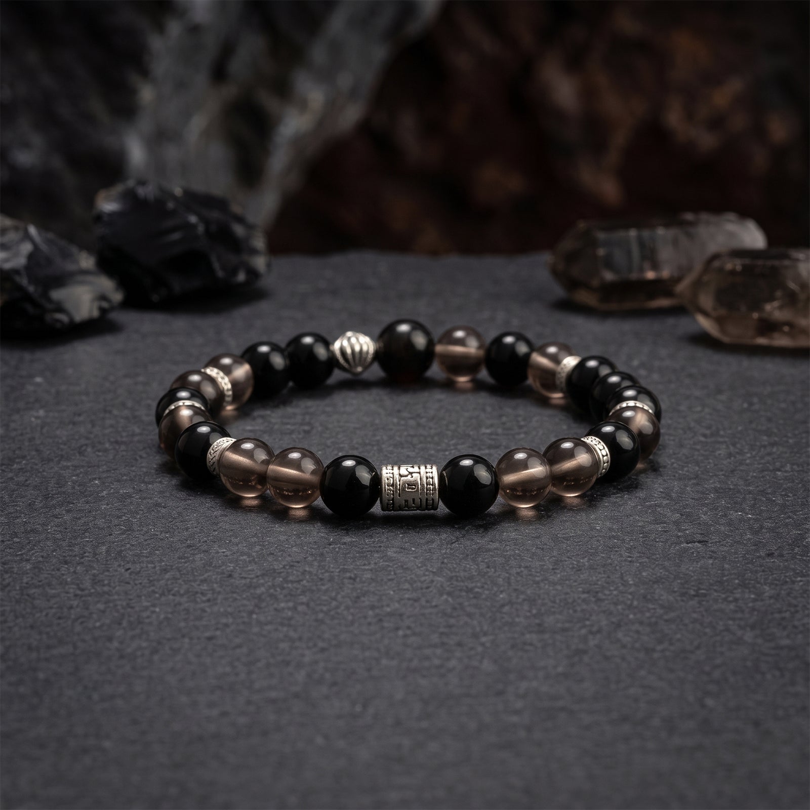 Beaded crystal bracelet with black round stones and silver-tone spacers