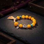 Tibetan Guardian · Amber, Turquoise & Silver Bracelet