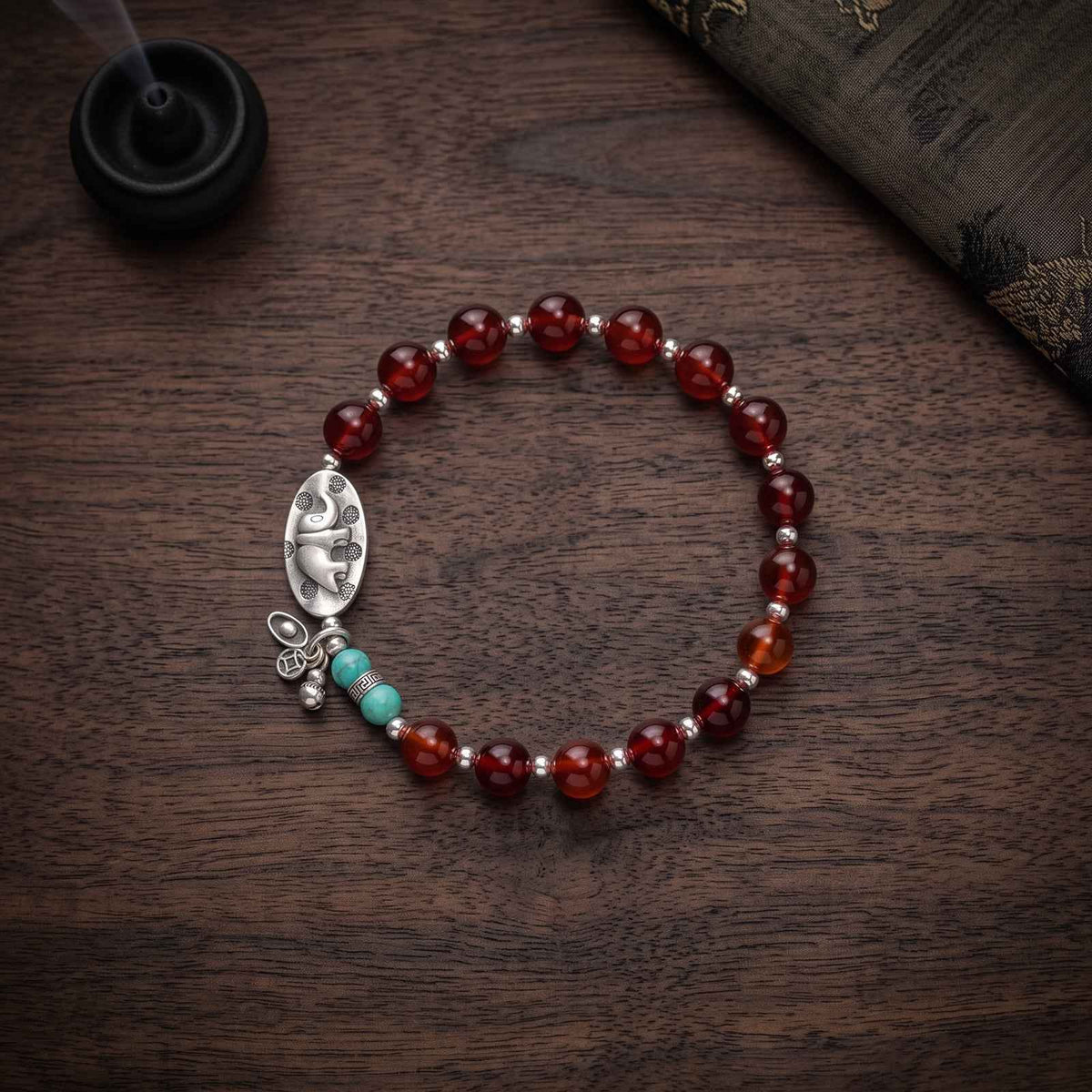 Tibetan Protection · Red Amber & Lucky Elephant Bracelet