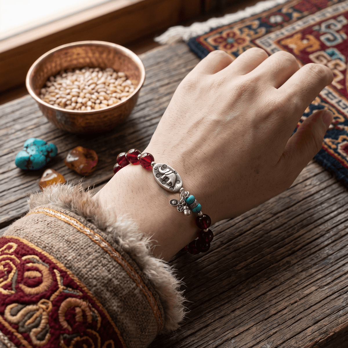Tibetan Protection · Red Amber & Lucky Elephant Bracelet