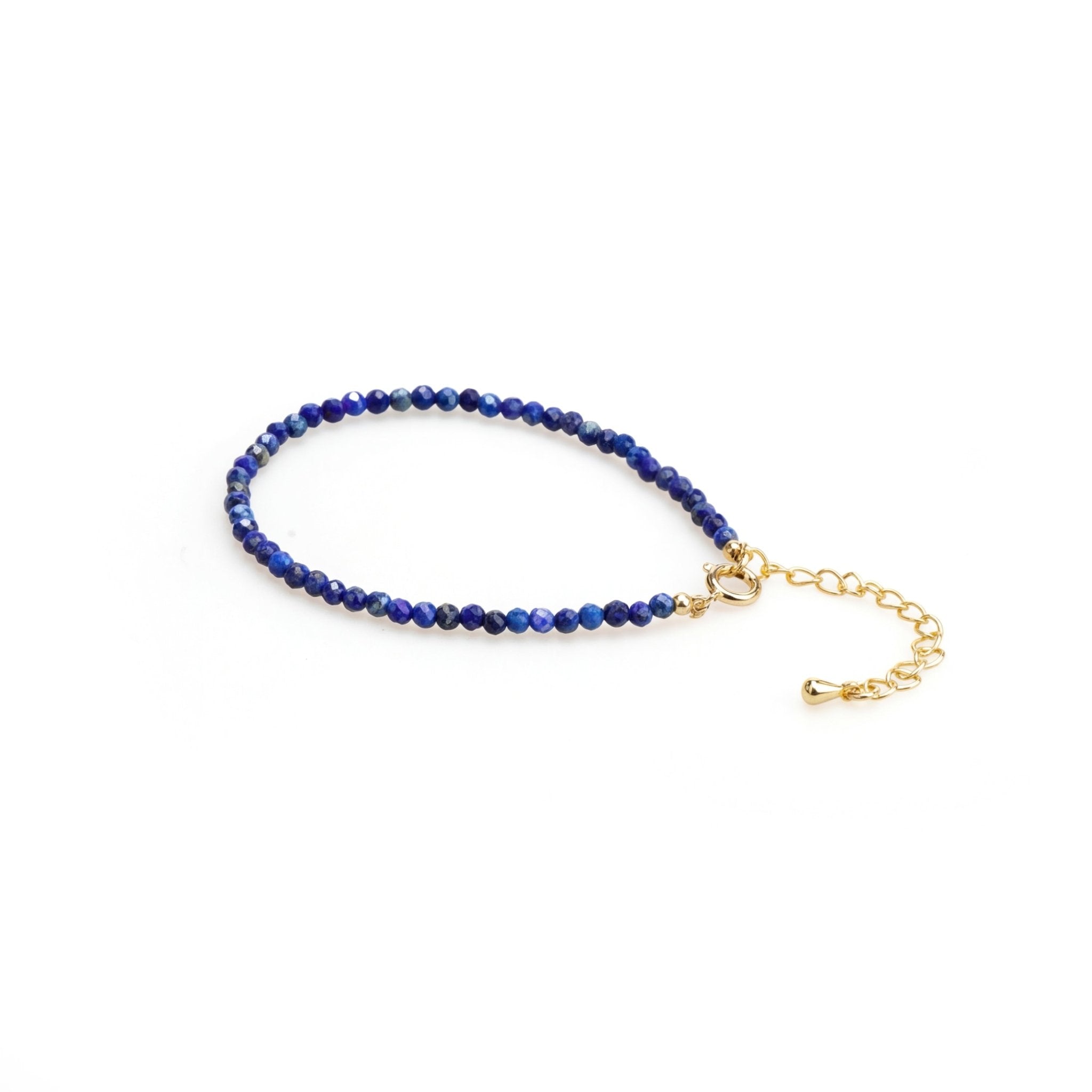 Lapis lazuli beaded bracelet with gold chain extension and small clasp