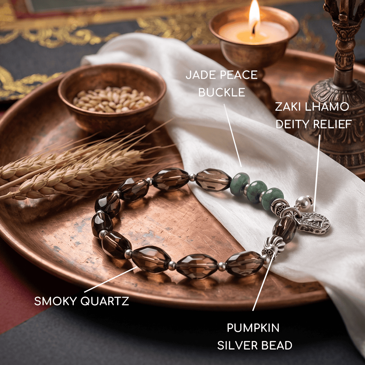 Smoky quartz and jadeite beaded prosperity bracelet with silver charms and toggle clasp