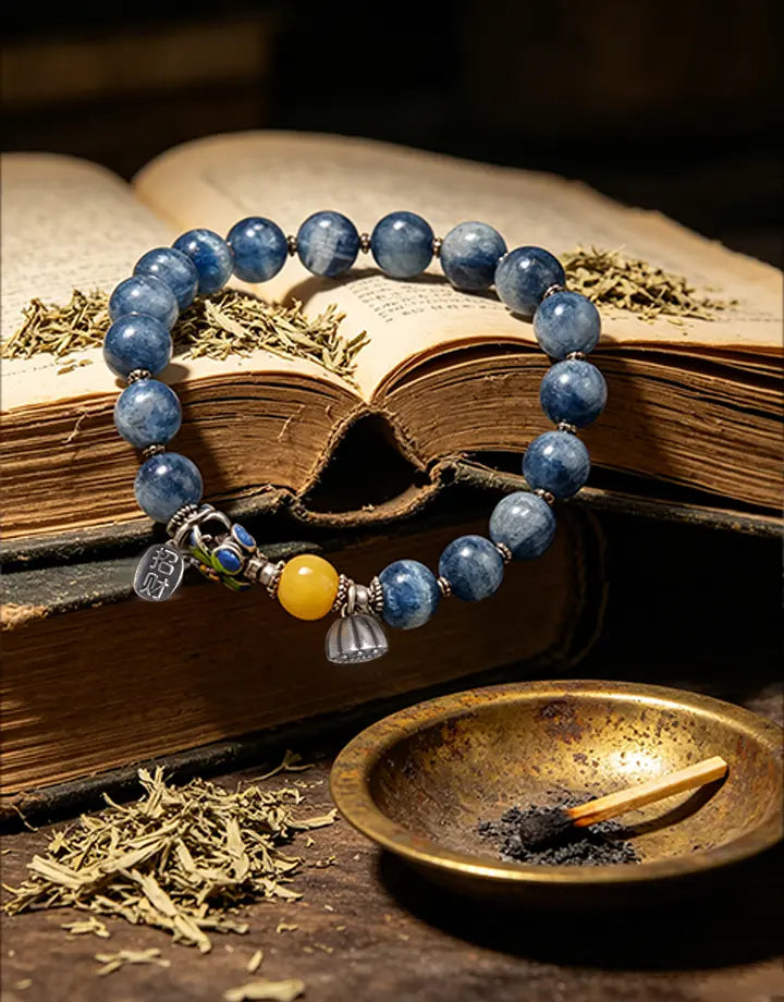 Handcrafted Kyanite energy bracelet for spiritual balance and manifestation, featuring authentic gemstones and artisan silver charms.