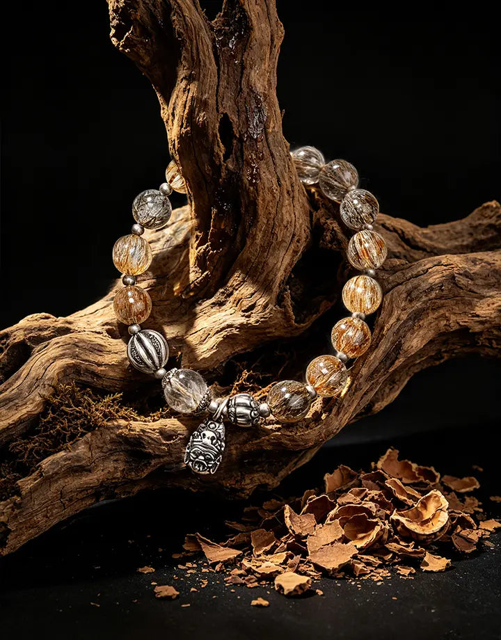 Handcrafted golden Rutilated Quartz energy bracelet for spiritual vitality and manifestation, featuring authentic gemstone beads.