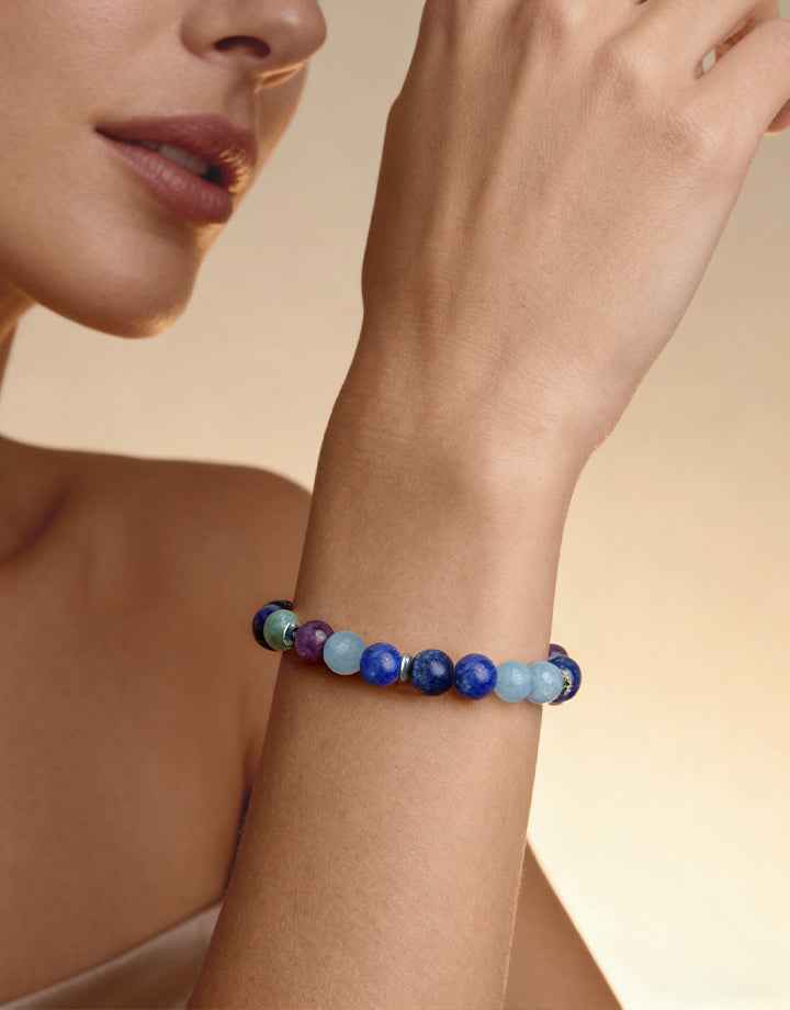 Amesha Energy Throat Chakra Truth Crystal Bracelet - Woman wearing blue Labradorite beads for clear communication and self-expression