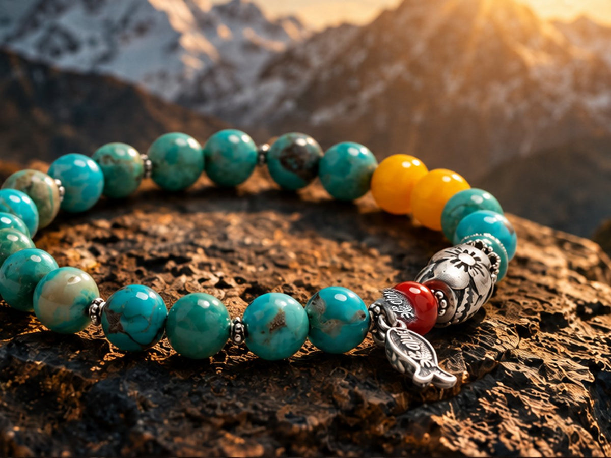 Mountain Blessings Turquoise and Amber Bracelet with Silver Fish Charm at Himalayan Sunrise