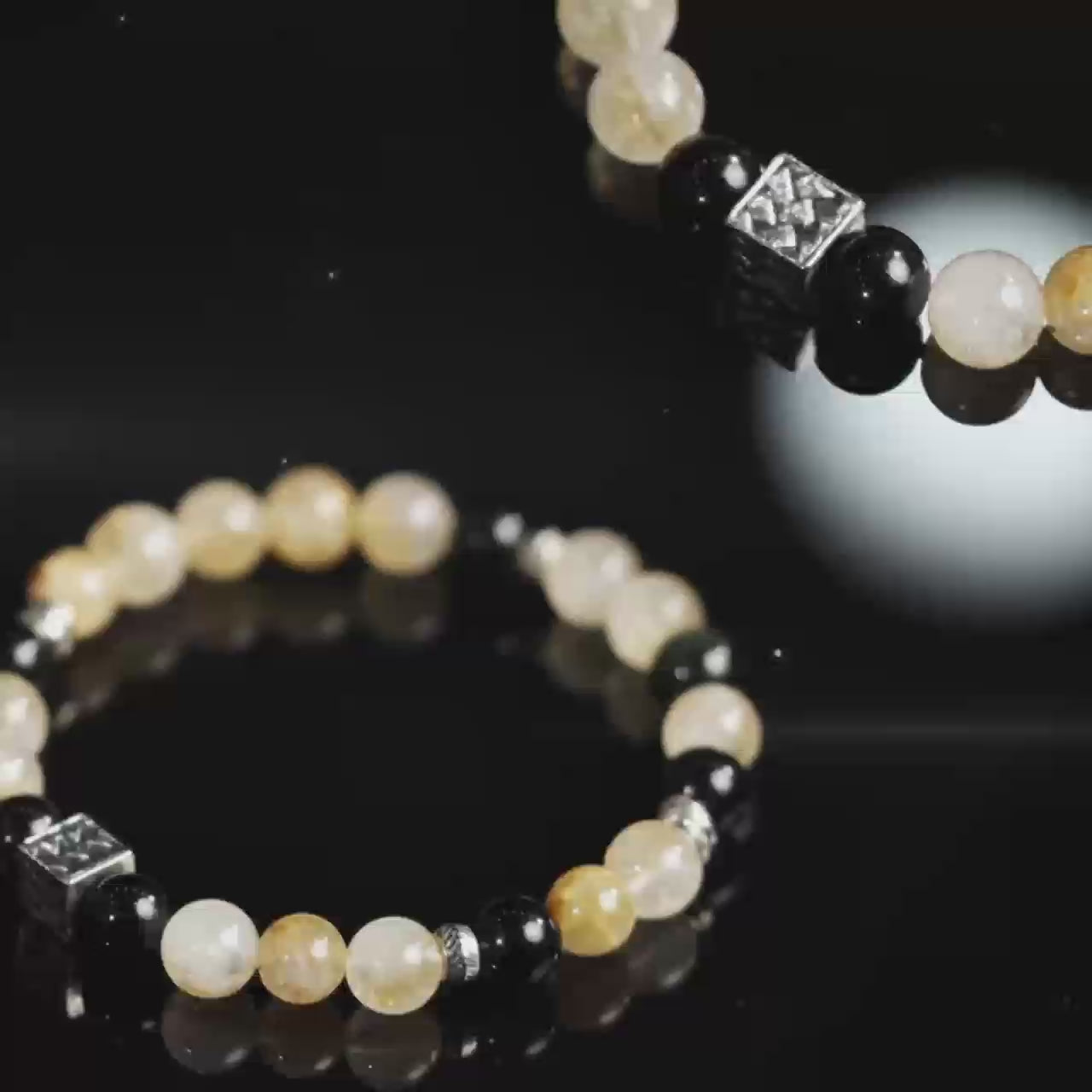 A handcrafted crystal talisman bracelet for root chakra protection, helping to strengthen personal energy and inner stability during daily use or workplace